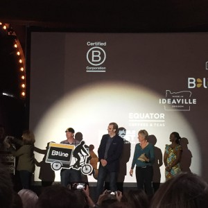 Franklin onstage acting out a coffee delivery